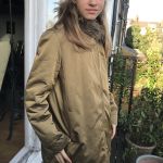 Delia is modelling her mother's coats: This is a Burberry gold coat bought in 2004.