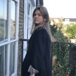 Delia is modelling her mother's jackets: Burberry jacket bought 1990